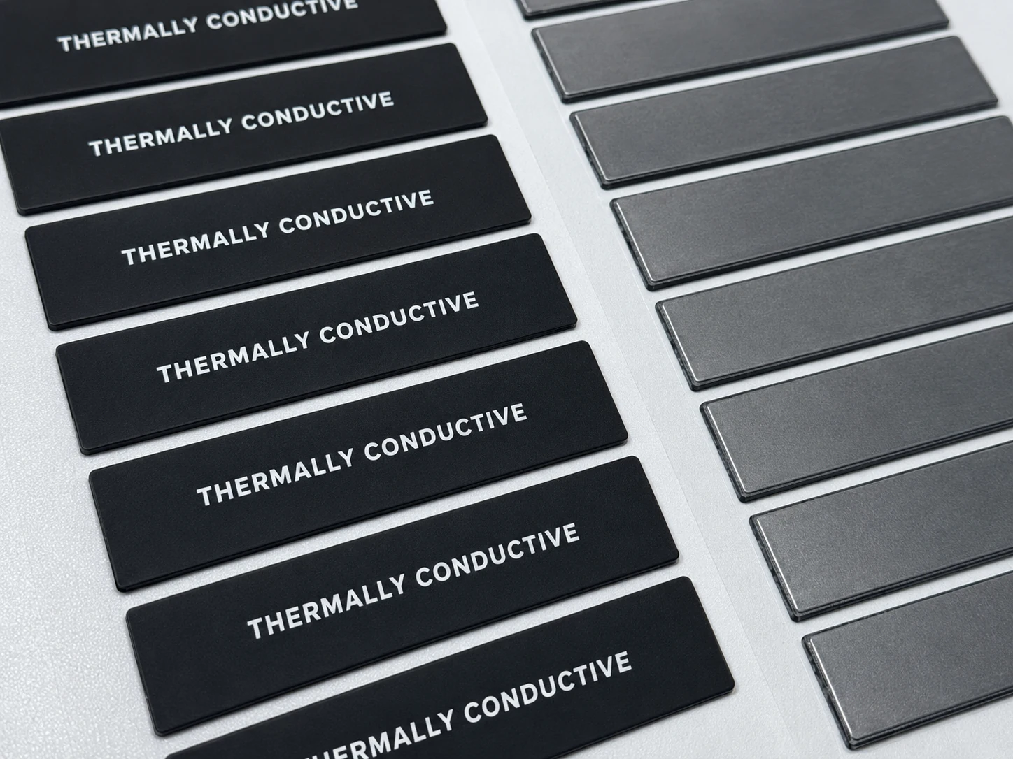 Printed composite thermal spreader label applied to a memory module